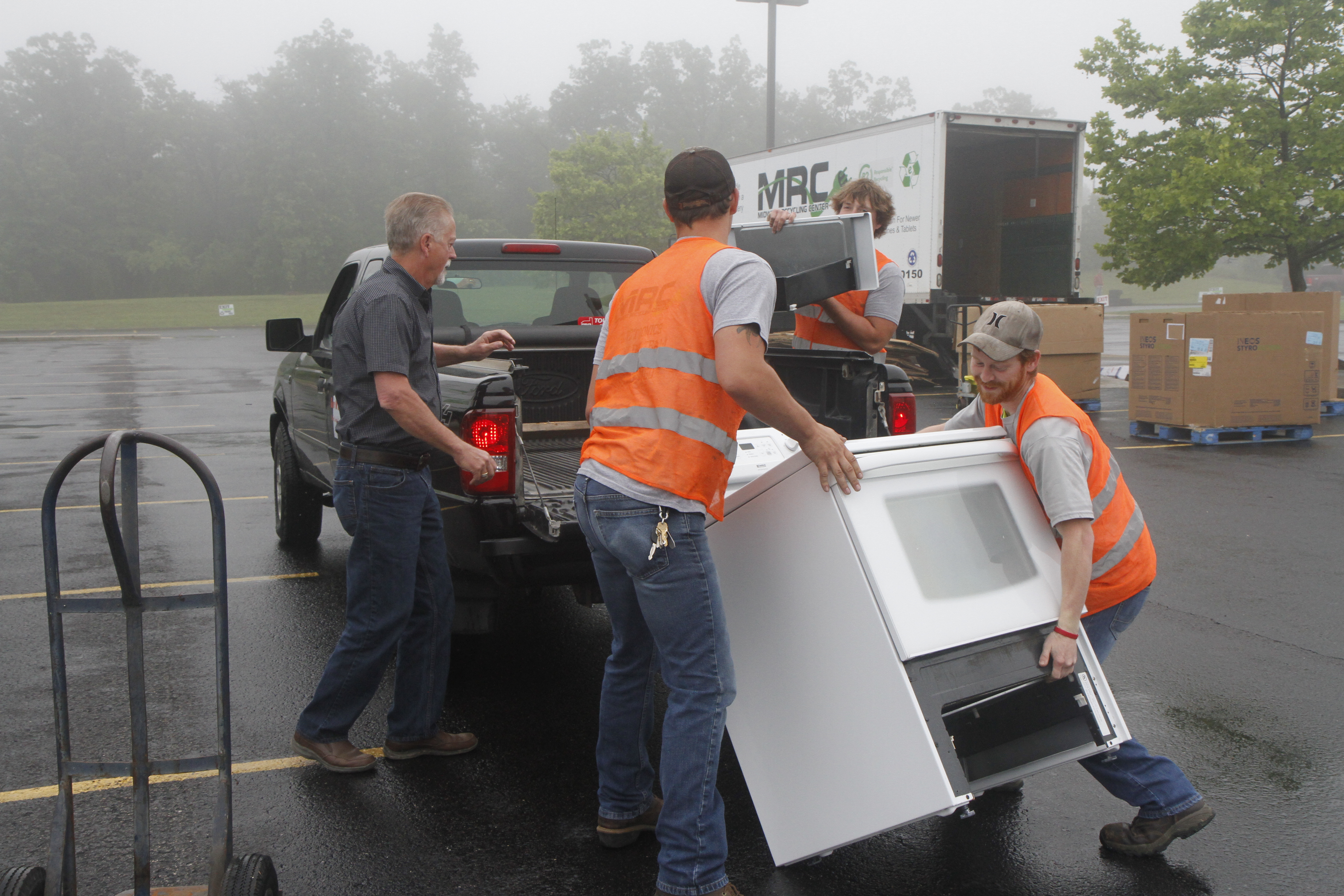 loading appliances on a truck - Ozark Rivers Solid Waste Management District