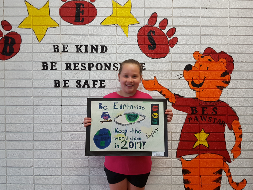 girl holding poster - Ozark Rivers Solid Waste Management District