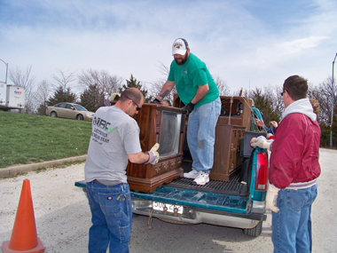 loading tvs on a truck - Ozark Rivers Solid Waste Management District