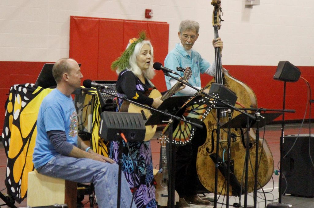 The Butterfly Band performing for elementary students.